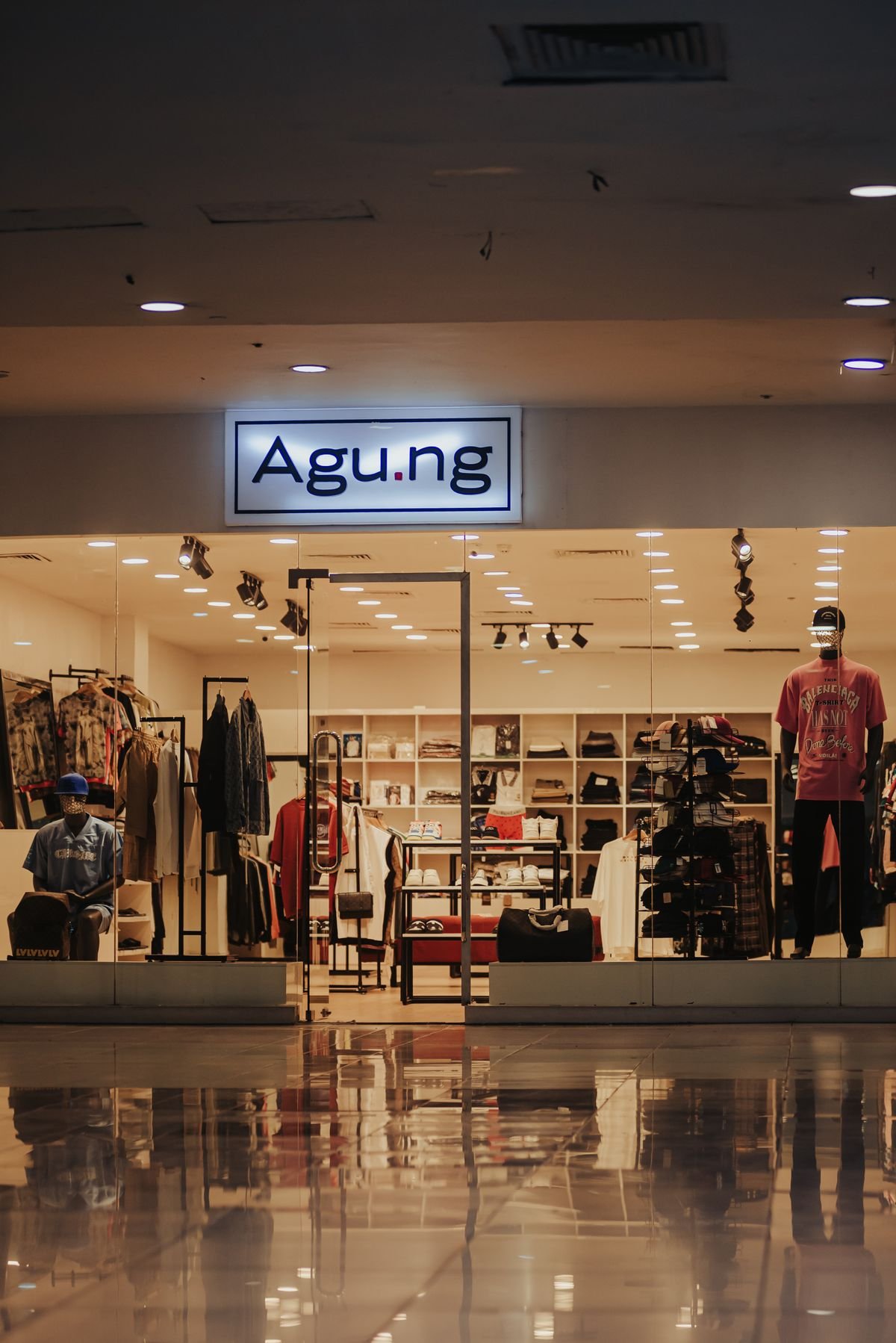 Clean, polished retail storefront with reflective floors